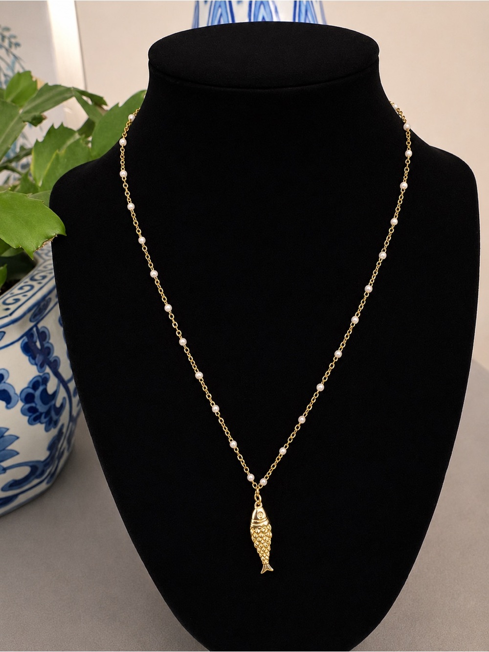 Gold-Tone Fish Pendant Necklace with White Bead Accents